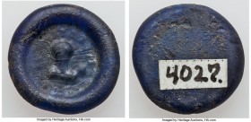 Anonymous. AD 6th-7th centuries. Blue glass weight of eight-siliquae or one tremissis (18mm, 1.54 gm). VF. Bust of eparch facing, illegible legend aro...