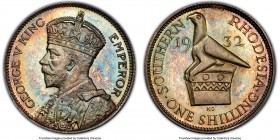 British Colony. George V Proof Shilling 1932 PR67 PCGS, KM3. Toned in an appealing array of soft pink and blue-green tones, and the single finest exam...