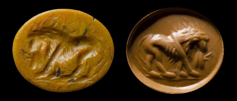 A roman yellow jasper intaglio. Lion. 
2nd - 3rd century A.D.
10 x 12 x3 mm
...