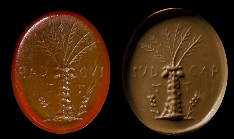 A roman carnelian intaglio. Palm tree and latin letters. 
1st century A.D. 
11...