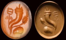 A roman carnelian intaglio. Emblema. 
2nd century A.D. 
8 x 10 x 2 mm

The allegorical depiction is composed by a cornucopia, a caduceus, a ear of...