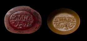 A roman carnelian intaglio. Inscriptions. 
3rd century A.D.
6 x 8 x 3 mm

Two inscribed lines in greek letters probably referred to Love. Traces o...