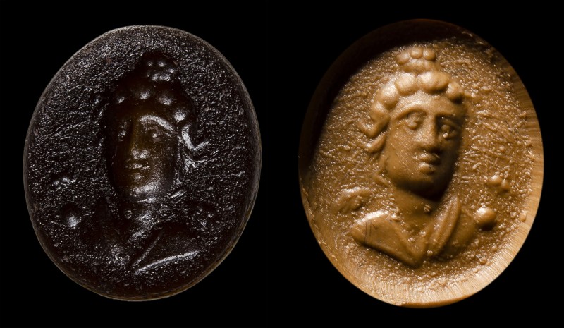 A roman brownish glass paste intaglio. Bust of Apollo. 
1st century B.C.- 1st c...