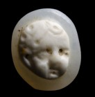 A roman two-layers agate cameo. Head of eros.
3rd century A.D.
8 x 9 x 4 mm

The head is presented slightly in three-quarters and characterized by...