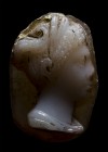 A roman two-layers agate cameo. Bust of emperess.
First quarter of the 2nd century A.D.
8 x 11 x 3 mm

The female figure is facing right, and char...