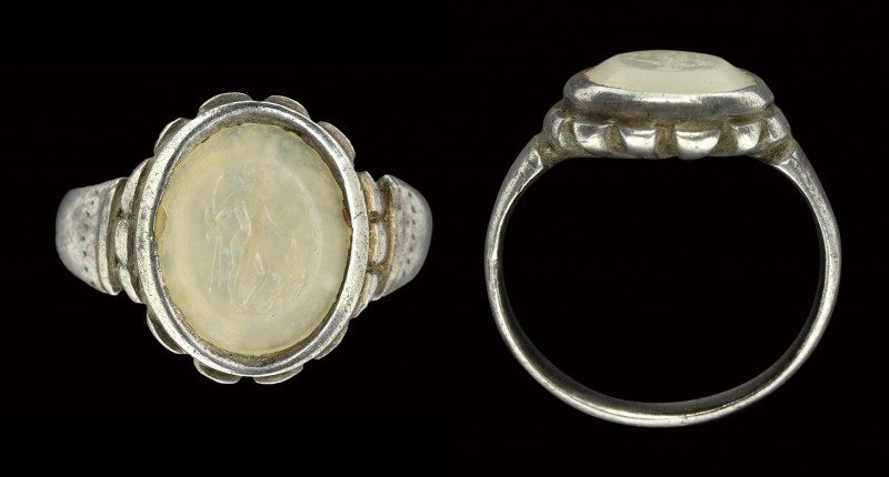 A roman nicolo-agate intaglio mounted in an ancient silver ring. Hunter with pre...