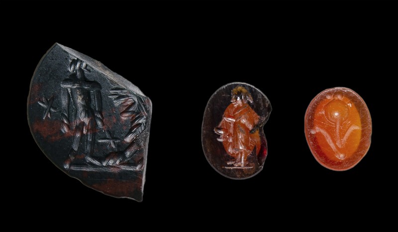 A lot of three roman intaglios of various stones. 
2nd - 3rd century A.D.
8 x ...