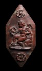 A neoclassical red jasper hexagonal cameo. Eros.
19th century 
19 x 40 mm

The seated winged figure is holding a large laurel wreath and a bow. On...