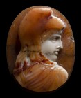 A postclassical three-layers agate cameo. Bust of Ganymede.
16th - 18th century
18 x 23 x 4 mm

The young character is facing right, wearing the p...