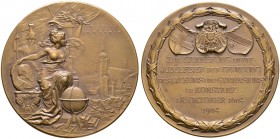 Konstanz, Stadt. 
Bronzemedaille 1904 von Lauer, auf das 300-jährige Bestehen des Gymnasiums. Weibliche Gestalt mit Lorbeerzweig und Porträtmedaillon...
