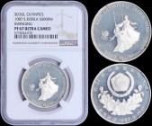 SOUTH KOREA: 5000 Won (1987) in silver (0,925) from 1988 Olympic Series. Obv: Arms above floral spray. Rev: Girls on swing. Inside slab by NGC "PF 67 ...