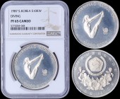 SOUTH KOREA: 10000 Won (1987) in silver (0,925) from 1988 Olympic Series. Obv: Arms above floral spray. Rev: High diver. Inside slab by NGC "PF 65 CAM...