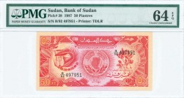 SUDAN: 50 Piastres (1987) in red on lilac and peach unpt with lyre and drum at left and outline map of Sudan at center. S/N: "B/92 497951". WMK: Arms....