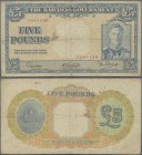 Bahamas: The Bahamas Government 5 Pounds L.1936, P.12, toned paper with tiny margin splits, Condition: F-/F. Affordable tough note!
 [zzgl. 19 % MwSt...