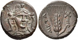 Lucania 
Metapontum. Circa 300-250 BC. Chalkous (Bronze, 18 mm, 4.59 g, 11 h). Facing bust of Athena, wearing wreathed triple-crested helmet, pearl n...