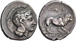 Lucania 
Velia. Circa 300-280 BC. Nomos (Silver, 21 mm, 7.58 g, 5 h). Head of Athena to right, wearing Attic helmet adorned with a griffin; behind he...