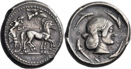 Sicily 
Syracuse. Deinomenid Tyranny, 485-466 BC. Tetradrachm (Silver, 25.5 mm, 17.21 g, 10 h), c. 480-475. Bearded male charioteer, wearing a long c...