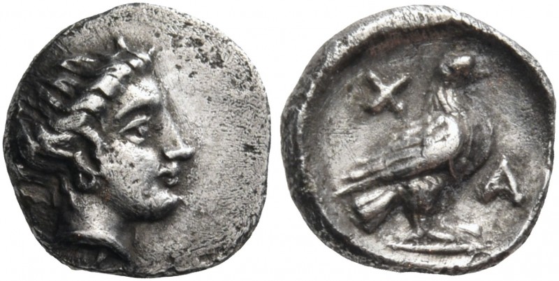 Euboia 
Chalkis. Circa 338-308 BC. Obol (Silver, 8.5 mm, 0.62 g, 3 h). Head of ...
