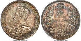 George V 50 Cents 1929 MS66 PCGS, Ottawa mint, KM25a. Another exceptionally toned specimen with an overlay of pastel hues that intensify with rotation...