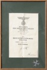 - Militaria, Orden und Ehrenzeichen Kriegsverdienstkreuz 1944 2. Klasse, mit Öse u. Ring und Verleihungsurkunde (Knickspuren), gerahmt 
 f.vz