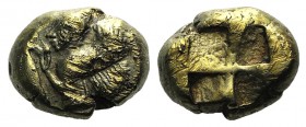 Mysia, Kyzikos, c. 550-500 BC. EL Hekte – Sixth Stater (9mm, 2.51g). Sphinx crouching l., raising forepaw, on [tunny l.] R/ Quadripartite incuse squar...