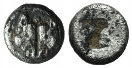 Lesbos, Unattributed early mint, c. 500-450 BC. BI 1/24 Stater (6mm, 0.51g). Confronted boars’ heads. R/ Four-part incuse square. HGC 6, 1071. Near VF...