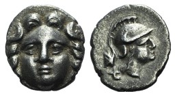 Pisidia, Selge, c. 250-190 BC. AR Obol (9mm, 0.71g, 12h). Facing gorgoneion. R/ Helmeted head of Athena r.; behind neck, astragalos above uncertain sy...