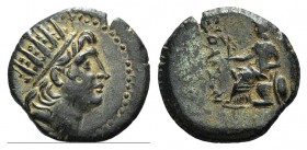 Cilicia, Soloi, c. 2nd-1st century BC. Æ (23mm, 7.10g, 12h). Radiate head of Helios r.; monogram behind. R/ Athena seated l., holding Nike and elbow o...