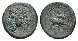 Cilicia, Soloi, c. 100-30 BC. Æ (24mm, 11.85g, 2h). Gorgoneion at centre of aegis. R/ Aphrodite, turreted, riding bull r., monogram above, owl to r. S...