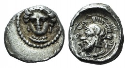 Cilicia, Tarsos. Time of Pharnabazos and Datames, c. 380-361/0 BC. AR Obol (7mm, 0.45g, 5h). Female head facing slightly l. R/ Helmeted and bearded ma...