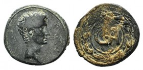 Augustus (27 BC-AD 14). Æ Sestertius (22mm, 10.15g, 12h). Pergamum, c. 25 BC. Bare head r. R/ CA within laurel wreath. RIC I 501; RPC I 2233. VF