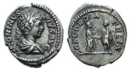 Caracalla (198-217). AR Denarius (18.5mm, 2.96g, 6h). Rome, AD 202. Laureate and draped bust r. R/ Caracalla standing l., holding volumen, clasping r....