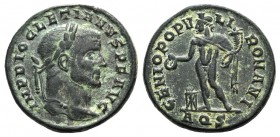 Diocletian (284-305). Æ Follis (26mm, 9.93g, 6h). Aquileia, AD 299. Laureate head r. R/ Genius standing l., sacrificing from patera over altar and hol...