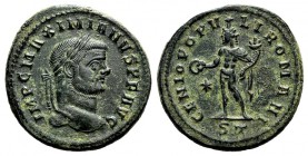 Maximianus (286-305). Æ Follis (27mm, 10.35g, 12h). Ticinum, 296-7. Laureate bust r. R/ Genius standing l., holding wreath and cornucopia. RIC VI 31b....