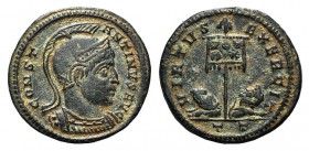 Constantine I (307/310-337). Æ Follis (19mm, 2.62g, 12h). Ticinum, 319-320. Helmeted and cuirassed bust r. R/ Two captives seated at base of standard ...