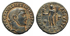 Maximinus II (310-313). Æ Follis (20mm, 5.13g, 12h). Antioch, AD 312. Laureate head r. R/ Genius standing facing, head l., holding cornucopia and bust...