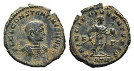 Constantine II (Caesar, 316-337). Æ Follis (20mm, 4.19g, 12h). Treveri, 317-8. Bareheaded and cuirassed bust r. R/ Constantine standing r., holding sp...
