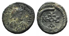 Justinian I (527-565). Æ 5 Nummi (14mm, 2.13g, 11h). Laureate and draped bust r. R/ Monogram. MIBE 163; DOC 272; Sear 245. Fine