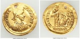 Honorius, Western Roman Empire (AD 393-423). AV solidus (21mm, 4.33 gm, 12h). Choice VF, holed. Milan, AD 395-402. D N HONORI-VS P F AVG, pearl-diadem...