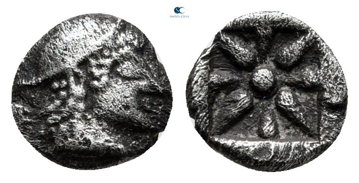 Asia Minor. Uncertain mint circa 500 BC. 
Hemiobol AR

7 mm., 0,43 g.

Helm...