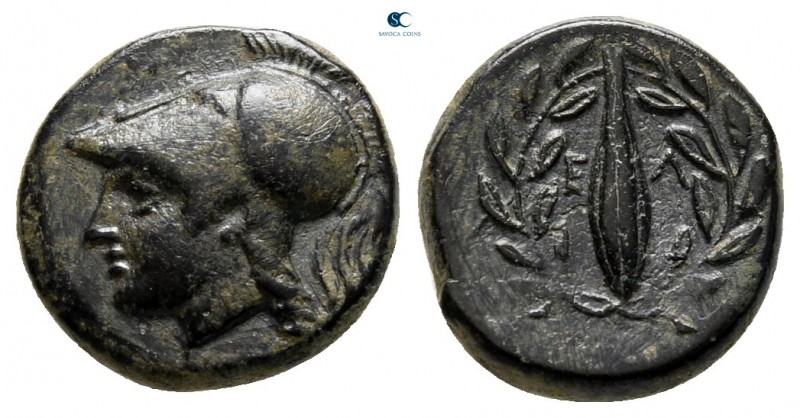Aeolis. Elaia circa 350-300 BC. 
Bronze Æ

11 mm., 1,46 g.

Helmeted head o...
