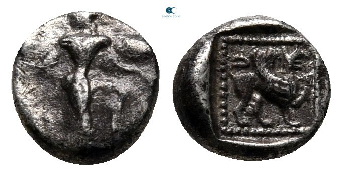 Caria. Kaunos 490-470 BC. 
Hemiobol AR

7 mm., 0,527 g.

Winged Iris with o...