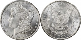 1892-CC Morgan Silver Dollar. MS-65+ (PCGS).

Lovely mint frost blankets surfaces that are brilliant apart from wisps of iridescent silver. The stri...