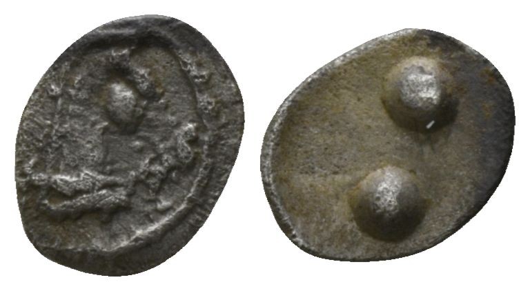 Sicily. Gela 480-475 BC.
Hexas of Dionkion AR

6mm., 0,07g.

Horse's head r...