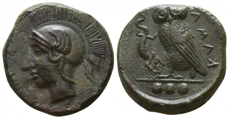 Sicily. Kamarina circa 420-410 BC.
Tetras AE

16mm., 3,47g.

Head of Athena...