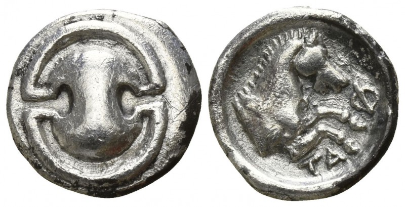 Boeotia. Tanagra circa 400-350 BC.
Obol AR

11mm., 0,86g.

Boeotian shield ...
