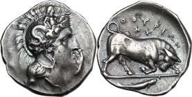 Greek Italy. Southern Lucania, Thurium. AR Stater, c. 400-350 BC. D/ Head of Athena right, wearing crested helmet decorated with Skylla holding triden...