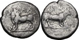 Greek Italy. Bruttium, Laus. AR Triobol, c. 480-460 BC. D/ Man-headed bull standing left, looking backwards; above, ΛA. R/ Calf standing right; above,...