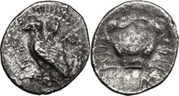 Sicily. Akragas. AR Litra, c. 450-439 BC. D/ Eagle standing left on Ionic capital; around, AK-PA. R/ Crab; below, IΛ (mark of value retrograde). SNG A...