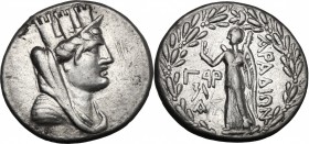Greek Asia. Phoenicia, Arados. AR Tetradrachm, dated CY 193 (67/66 BC). D/ Turreted, veiled, and draped bust of Tyche right. R/ Nike standing left, ho...
